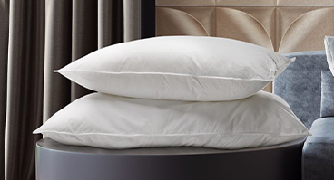 Three Down Pillows stacked